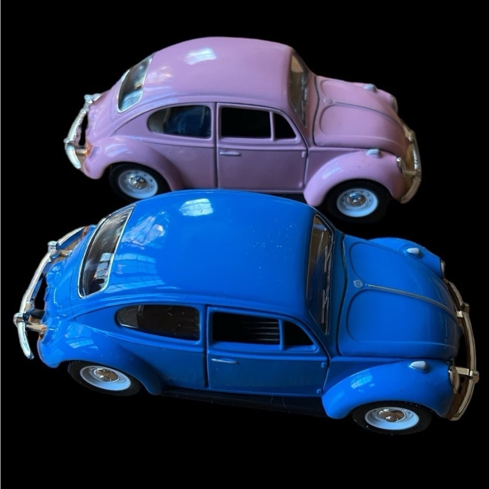 Two new Volkswagen beetles die cast cars